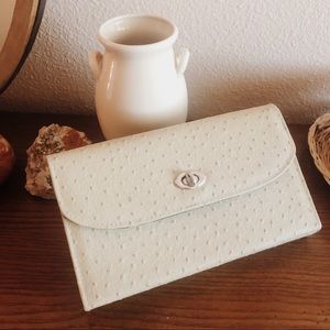 Clutch for coupons or envelope system